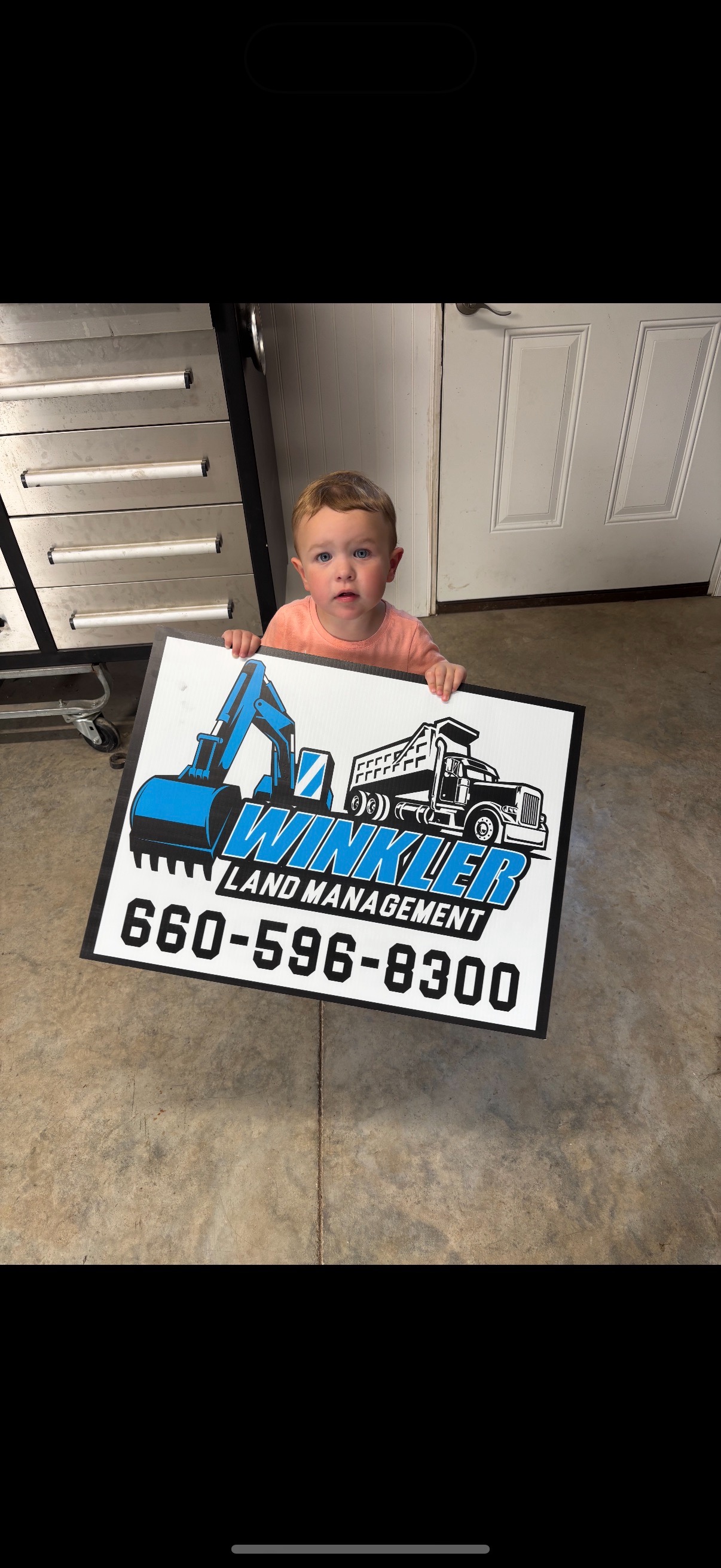 Winkler Land Management job-site sign with company phone number Winkler Land Management job-site sign with company phone number